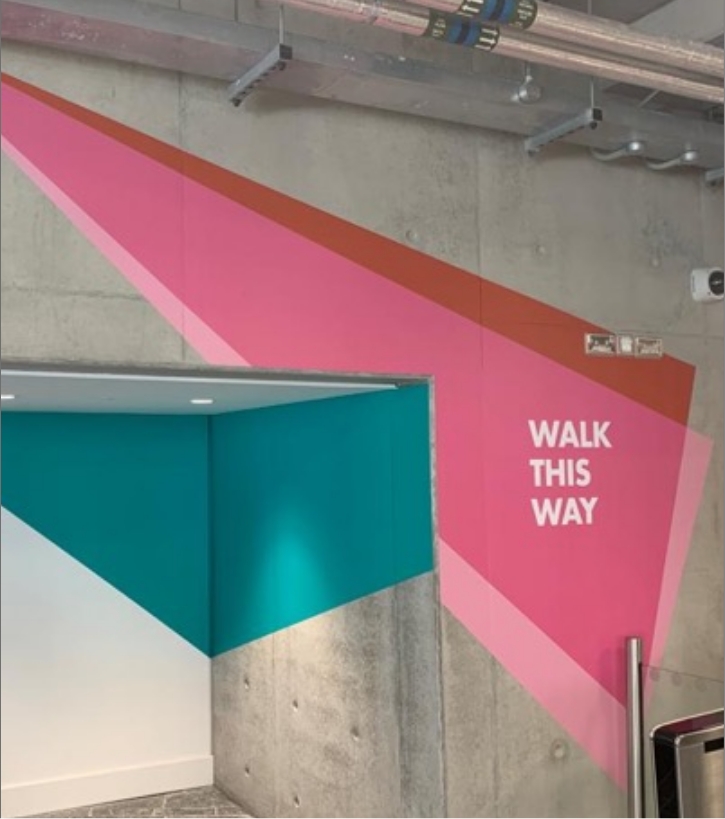 Wall graphic with the words 'Walk this way'